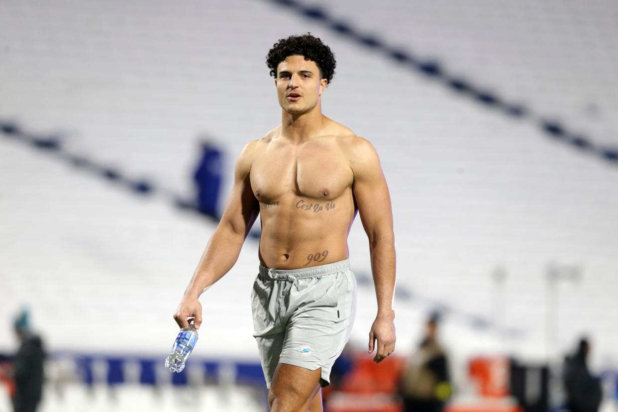 Miami Dolphins linebacker Jaelan Phillips during warmups before an NFL football game against the Buffalo Bills in Orchard Park, N.Y., Saturday, Dec. 17, 2022. (AP Photo/Joshua Bessex)