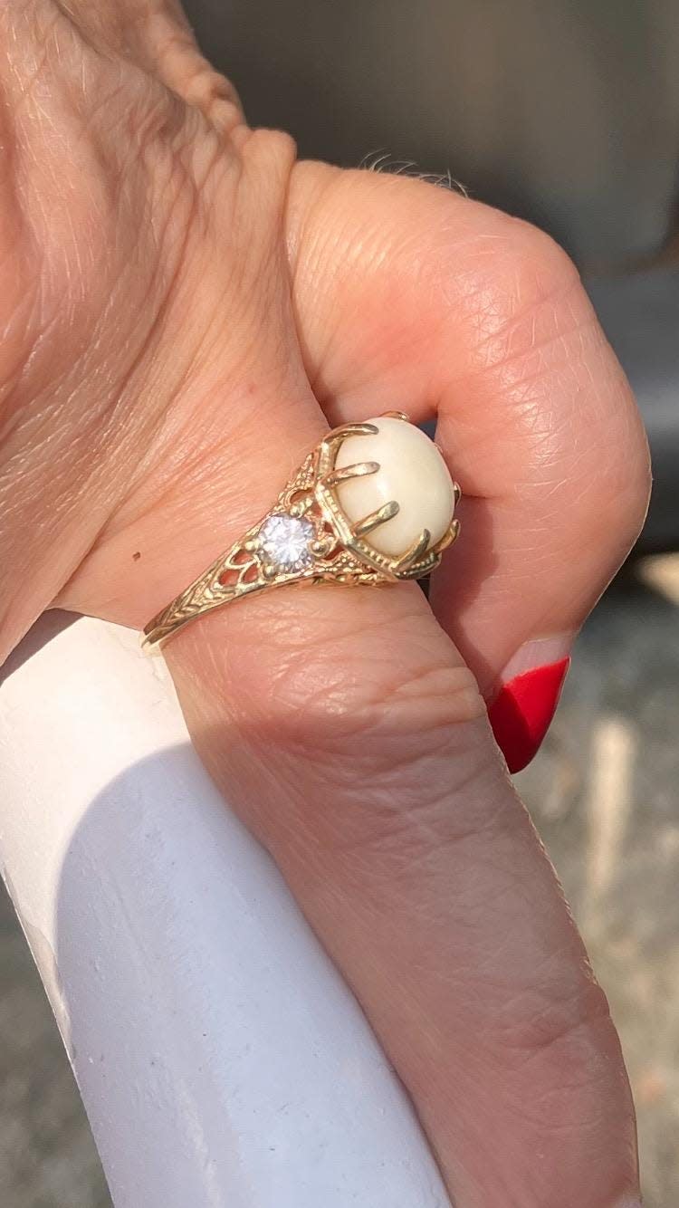 A ring made with a mercenaria pearl. Couple Sandy Sikorski and Ken Steinkamp found the pearl while dining at a restaurant in December of 2021.