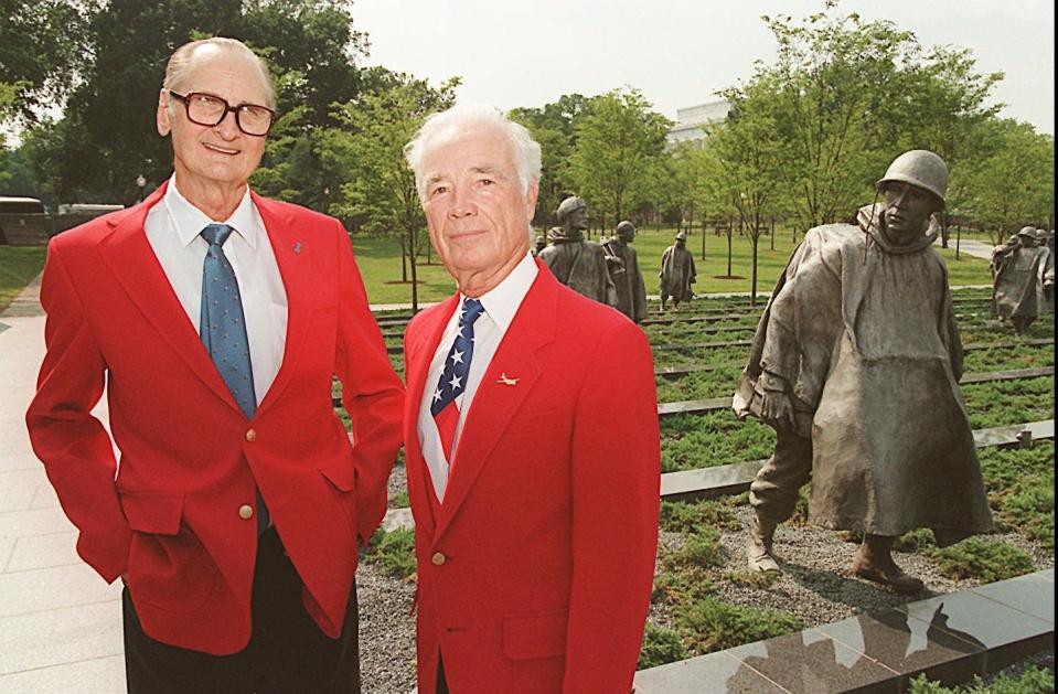 In this July 1995 FLORIDA TODAY front-page photo, Don Mathews (right) stands alongside fellow Air Force 13th Bomb Squadron veteran Charles Hinton of Satellite Beach at the new Korean War Veterans Memorial before its dedication ceremony in Washington, D.C. Hinton died in 2018.