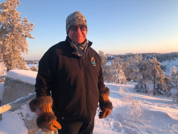 Felix Lockhart is a Yellowknife-based elder and former chief of Łutsel K'e Dene First Nation. He says urgent action is needed on climate change. (Loren McGinnis/CBC - image credit)