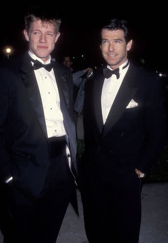 <p>Ron Galella, Ltd./Ron Galella Collection via Getty</p> Actor Pierce Brosnan and son Christopher Brosnan attend the 64th Annual Academy Awards Pre-Party in 1992