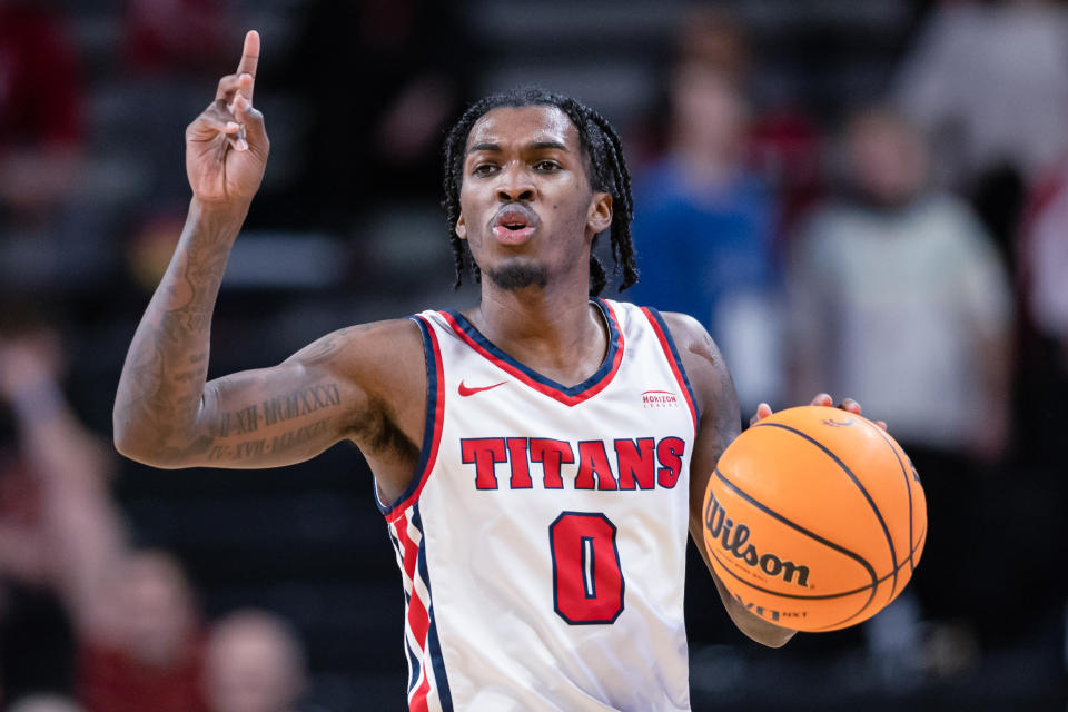 CINCINNATI, OH - DECEMBER 21: Antoine Davis #0 of the Detroit Mercy Titans brings the ball up court during the game against the Cincinnati Bearcats at Fifth Third Arena on December 21, 2022 in Cincinnati, Ohio. (Photo by Michael Hickey/Getty Images)