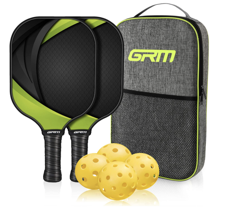 Pickleball Set with two rackets and four yellow balls (Photo via Amazon)