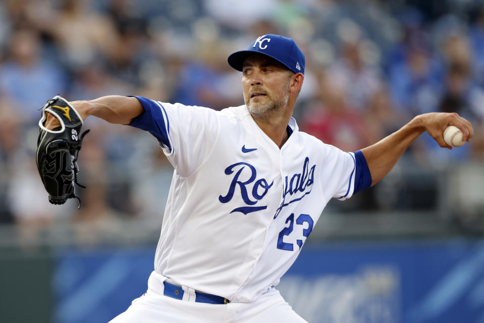 Kansas City Royals pitcher Mike Minor throws against a Chicago White Sox batter in the first inning of a baseball game at Kauffman Stadium in Kansas City, Mo., Monday, July 26, 2021. (AP Photo/Colin E. Braley)
