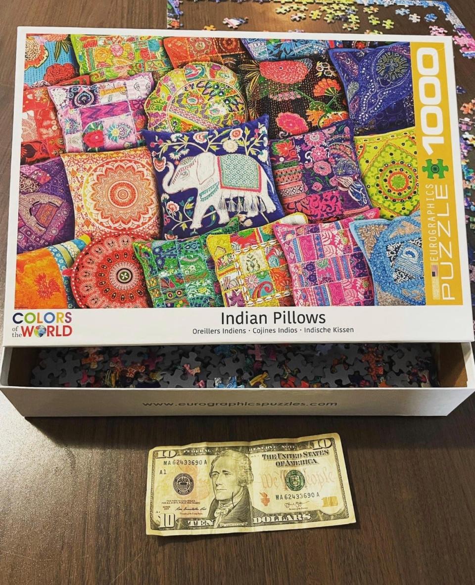 One of the couple's fundraising projects was selling squares of a puzzle for $10. The names were put on each piece so someday their child will know who helped make adoption a reality.