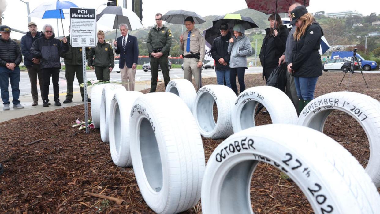 <div>Malibu, California February 26, 2024-Members of Streets are for Everyone and Fix P.C.H. and other officials pause for a moment of silence as they add another Ghost Tire to a memorial bringing the number to fifty nine, in honor of every person killed along Pacific Coast Highway in Malibu since 2010. The latest Ghost Tire is being placed in honor of 32-year-old Jose Alfonso De Lira Piedra. (Wally Skalij/Los Angeles Times via Getty Images)</div>