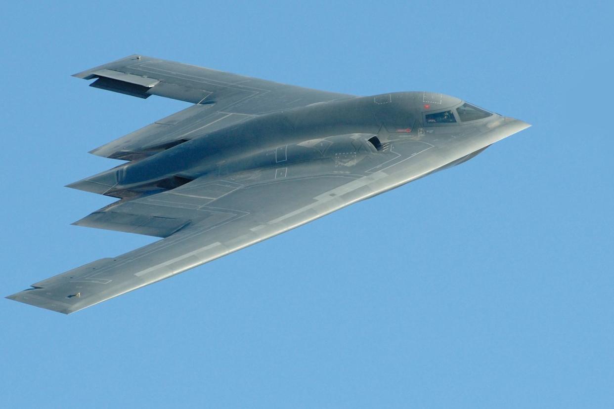 closeup photo of a b2 stealth bomber in flight