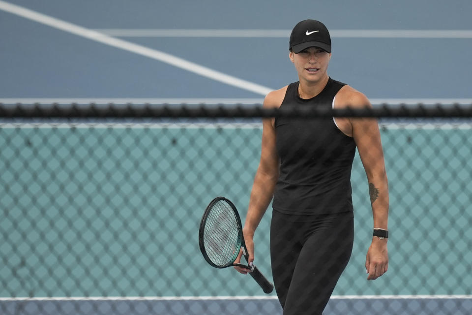 Aryna Sabalenka, of Belarus, walks on a practice court at the Miami Open tennis tournament, Thursday, March 21, 2024, in Miami Gardens, Fla. (AP Photo/Rebecca Blackwell)