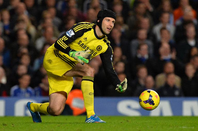 Chelsea's Czech goalkeeper Petr Cech throws the ball out at Stamford Bridge in west London on October 27, 2013