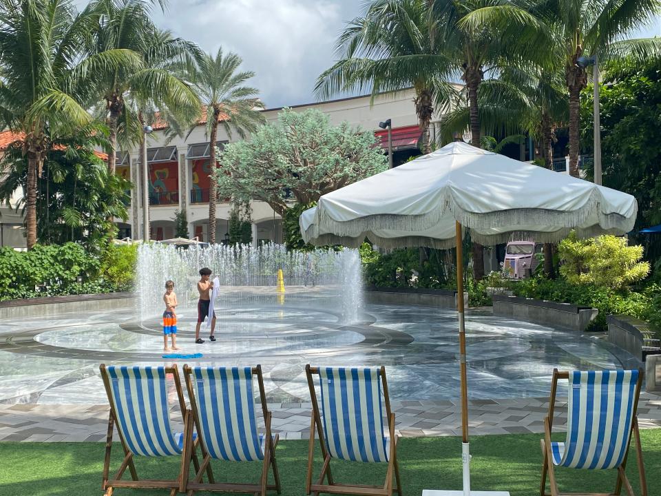 Kids enjoy a day in the fountains at The Square, which has undergone numerous changes and is in the process of its latest transformation.