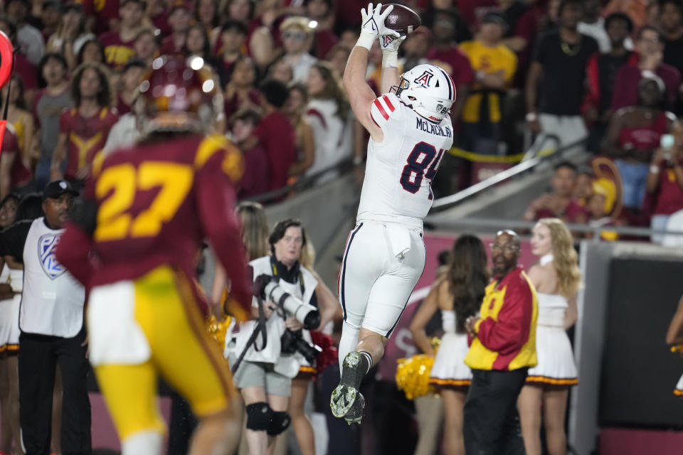 Arizona tight end Tanner McLachlan (84) makes a touchdown catch against Southern California during the first half of an NCAA college football game Saturday, Oct. 7, 2023, in Los Angeles. (AP Photo/Marcio Jose Sanchez)