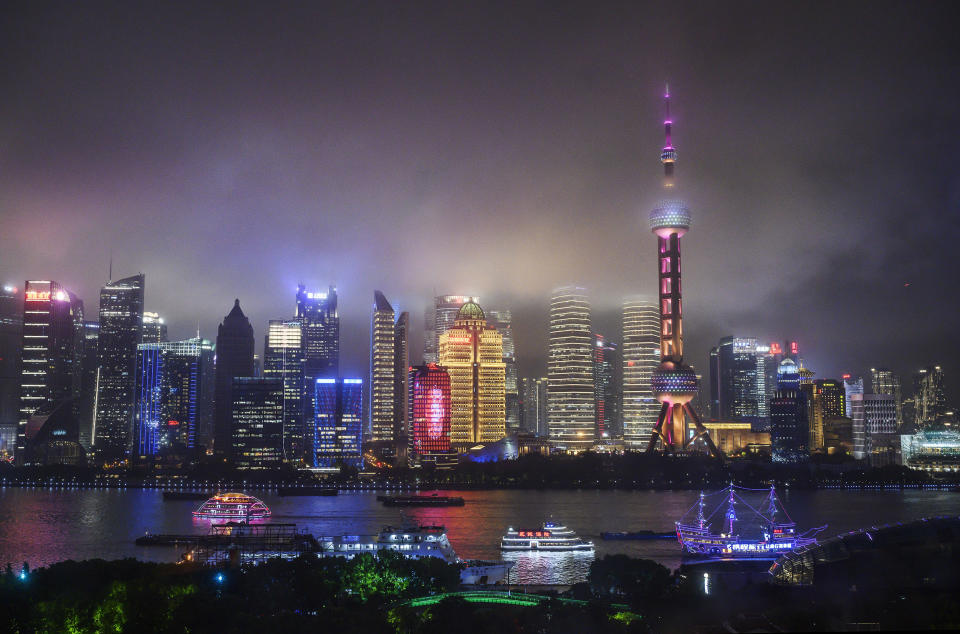 Image: Boats travel on the Huangpu River as the skyline of the city is is seen, including the Oriental Pearl TV Tower and the Shanghai Tower (Kevin Frayer / Getty Images file)