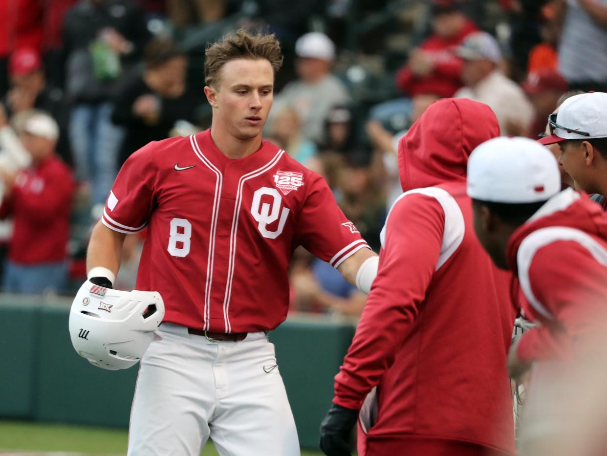 Leadoff-batting center fielder John Spikerman (8) returned to the Oklahoma lineup after missing five weeks following hamate surgery. OU's lead in the Big 12, however, went from three games at the start of last week to one game after Texas swept the Sooners in a doubleheader Sunday in Norman, Oklahoma.