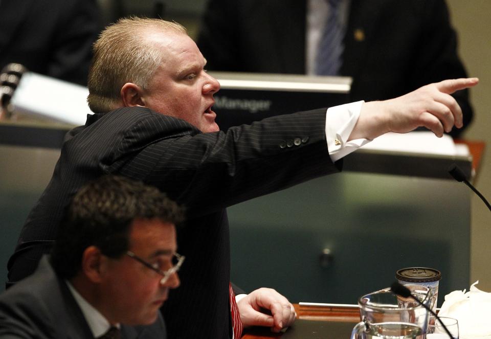 Toronto Mayor Rob Ford reacts during a special council meeting at City Hall in Toronto
