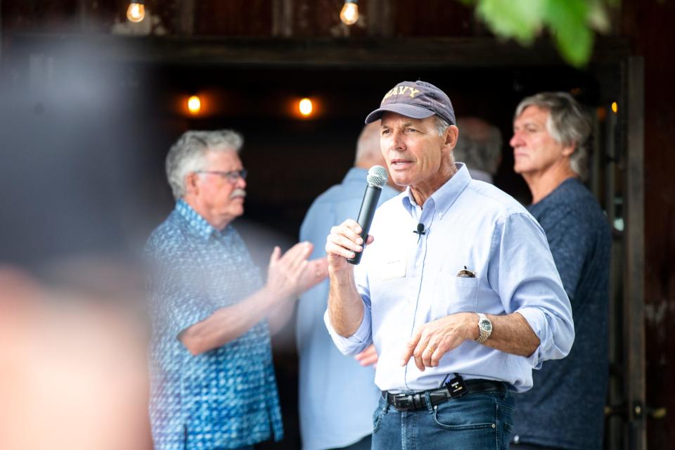 Democratic U.S. Senate candidate Mike Franken speaks during the inaugural County Line fundraiser, Saturday, Sept. 3, 2022, at Sutliff Farm & Cider House in Lisbon, Iowa.