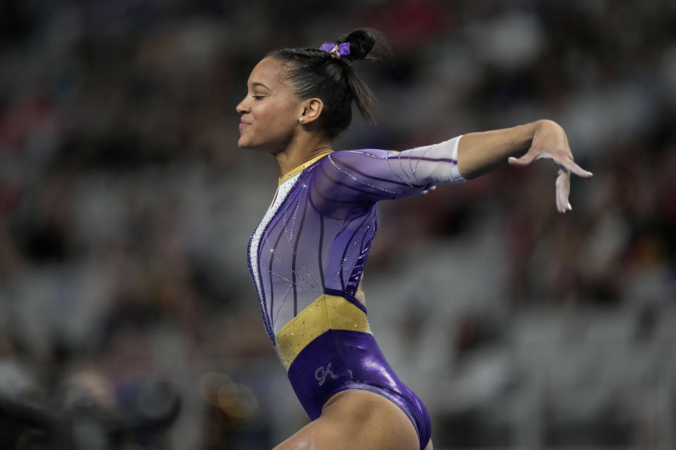 LSU's Haleigh Bryant compete on the floor exercise during the semifinals of the NCAA women's semifinals gymnastics championships, Thursday, April 13, 2023, in Fort Worth, Texas. (AP Photo/Tony Gutierrez)