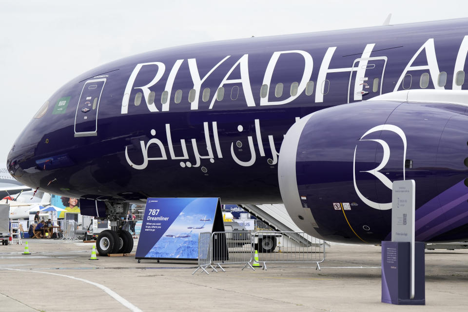 FILE - A Riyadh Air Boeing 787-9 Dreamliner is displayed at the Paris Air Show in Le Bourget, north of Paris, France, Tuesday, June 20, 2023. Airlines are facing increasing pressure to cut their climate-changing emissions. That made sustainable aviation fuel a hot topic this week at the Paris Air Show, a major industry event. Sustainable fuel made from food waste or plant material is aviation's best hope for reducing emissions in the next couple of decades. ( (AP Photo/Lewis Joly, File)