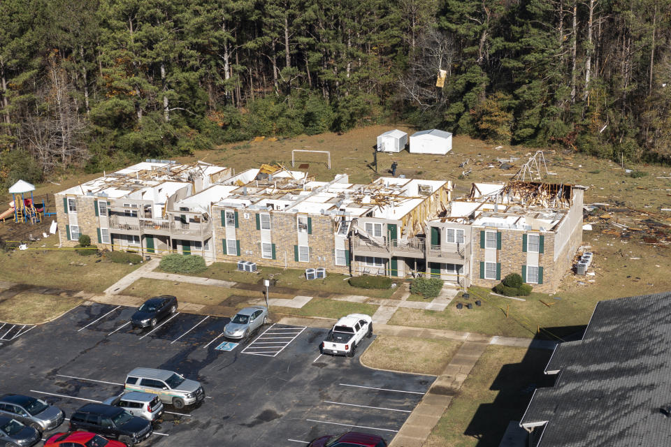 This aerial image shows roof damage to the Sagewood Apartments after an apparent tornado, Wednesday, Nov. 30, 2022, in Eutaw, Ala. (AP Photo/Vasha Hunt)