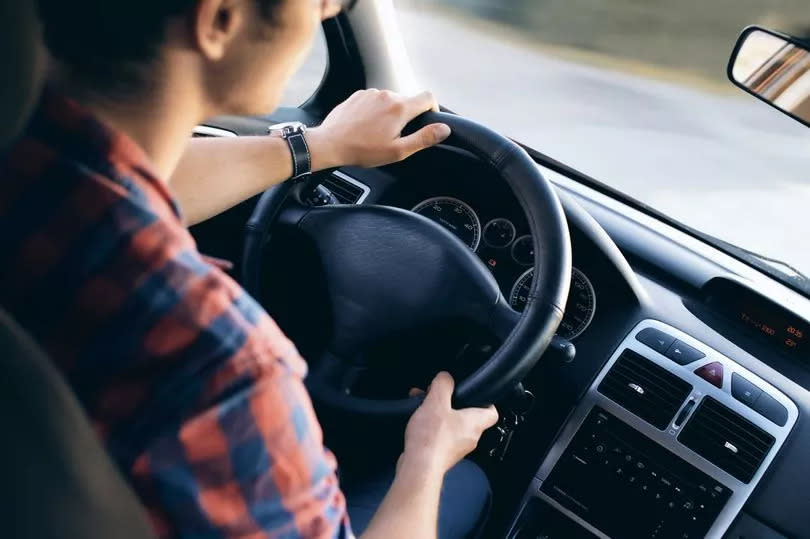 A driver behind the wheel