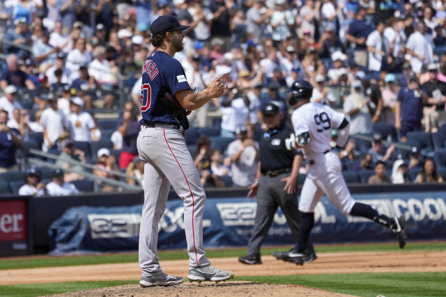 New York Yankees' Isiah Kiner-Falefa reacts after hitting a grand