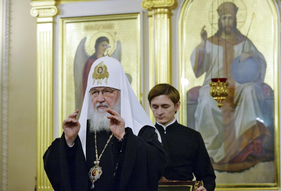 In this handout photo released by Russian Orthodox Church Press Service, Russian Orthodox Church Patriarch Kirill presides over a meeting of the church's Holy Synod of the Russian Orthodox Church, in Moscow, Russia, Friday, Sept. 14, 2018. The meeting of the Russian Orthodox Church's top hierarchs mulled a response to a decision by Orthodox Christianity's leading body to send two envoys to Ukraine. (Sergey Vlasov, Russian Orthodox Church Press Service via AP)