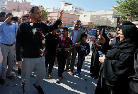 Family and friends celebrate as Ali Al-Ekri is welcomed home after completing his five-year sentence, in Manama, Bahrain March 10, 2017. REUTERS/Hamad I Mohammed