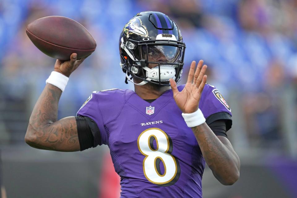 Aug 14, 2021; Baltimore, Maryland, USA; <a class="link " href="https://sports.yahoo.com/nfl/teams/baltimore/" data-i13n="sec:content-canvas;subsec:anchor_text;elm:context_link" data-ylk="slk:Baltimore Ravens;sec:content-canvas;subsec:anchor_text;elm:context_link;itc:0">Baltimore Ravens</a> quarterback Lamar Jackson (8) warms up prior to the game against the New Orleans Saints at M&T Bank Stadium. Mandatory Credit: Mitch Stringer-USA TODAY Sports