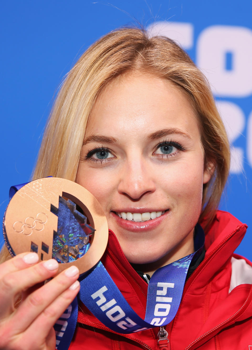 <p>Bronze medalist Lara Gut of Switzerland celebrates during the medal ceremony for the Alpine Skiing Women’s Downhill on day five of the Sochi 2014 Winter Olympics at Medals Plaza on February 12, 2014 in Sochi, Russia. (Photo by Robert Cianflone/Getty Images) </p>