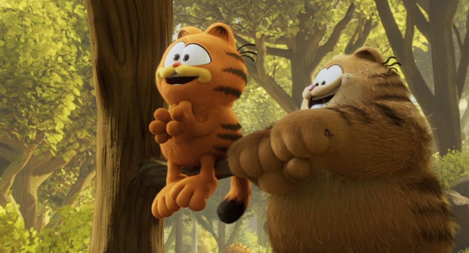 This image released by Sony Pictures shows characters Vic, voiced by Samuel L. Jackson, right, and Garfield, voiced by Chris Pratt, in a scene from the animated film "The Garfield Movie." (Columbia Pictures/Sony via AP)