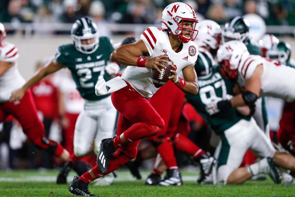 Nebraska Cornhuskers quarterback Adrian Martinez (2) runs the ball against the Michigan State Spartans during the second quarter at Spartan Stadium on Saturday, Sept. 25, 2021.