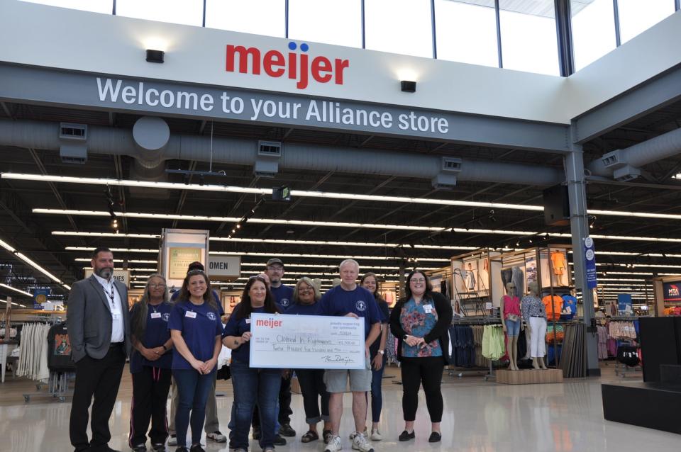 Meijer officials donated $12,500 to the Alliance homeless ministry, Clothed in Righteousness, on May 8, 2024, during a preview tour of the new Alliance supercenter.