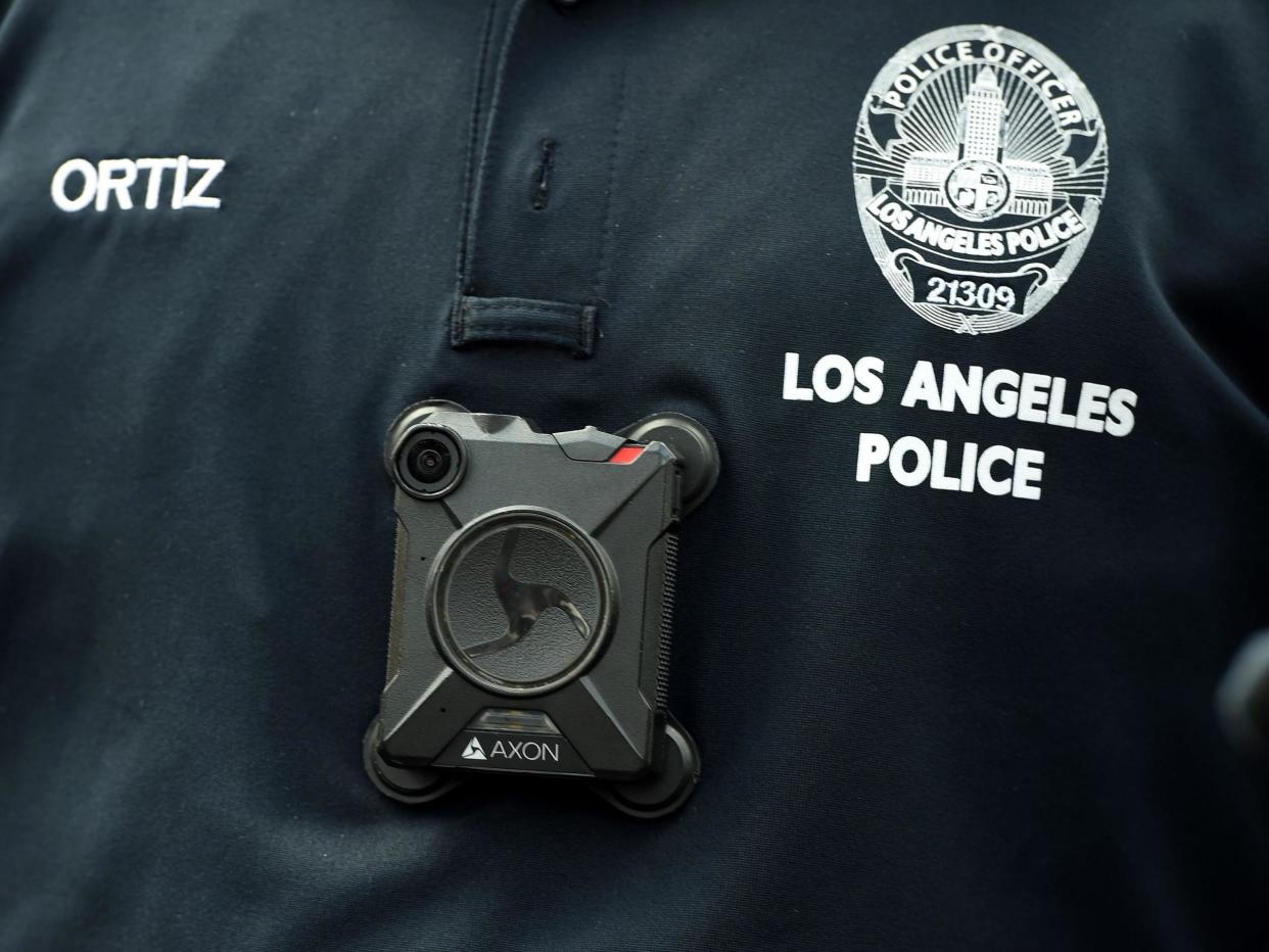 A Los Angeles Police Department officer wears a body camera at the Los Angeles Gay Pride Resist March: AFP via Getty Images