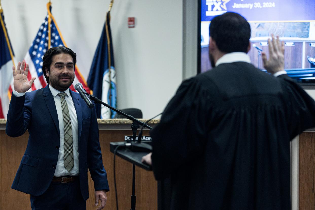 Newly elected District 2 city Rep. Josh Acevedo is sworn in by Judge Josh Herrera on Tuesday, Jan. 30, 2024, at El Paso City Hall.
