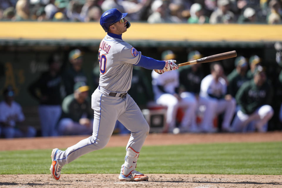 New York Mets' Pete Alonso watches his home run during the ninth inning of a baseball game against the Oakland Athletics in Oakland, Calif., Sunday, April 16, 2023. (AP Photo/Jeff Chiu)
