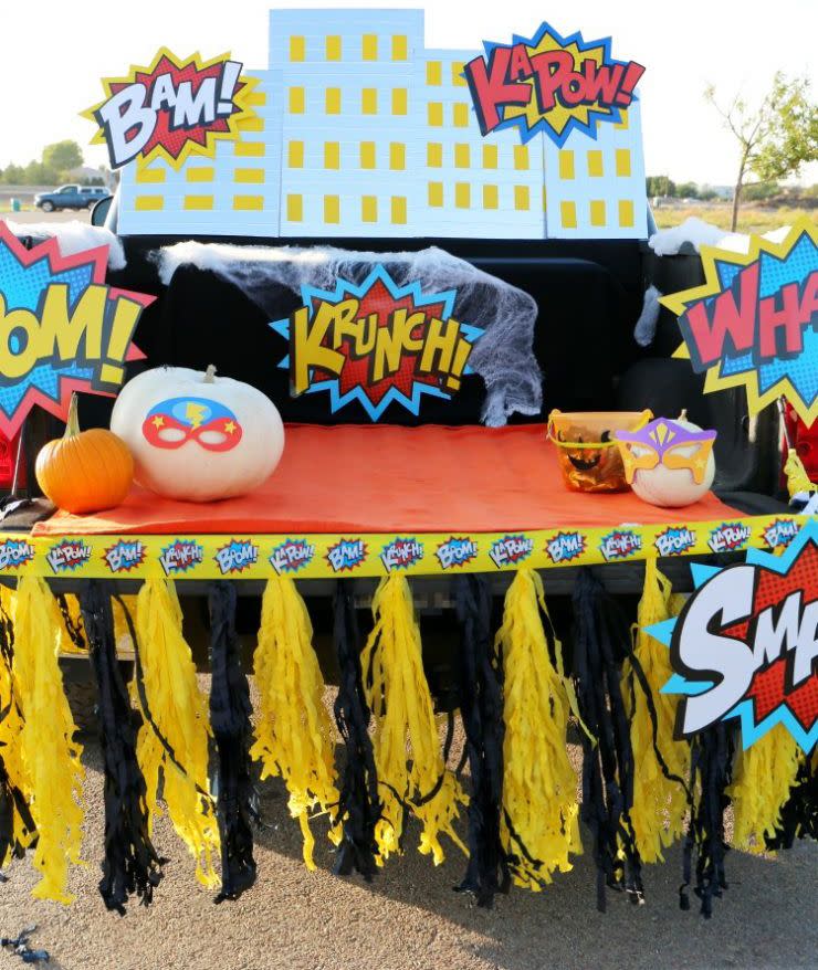 <p>You'll probably see a lot of superheroes pass by on Halloween. Why not give them a comic-book skyline to pose in front of?</p><p><a href="http://www.deonnawade.com/superhero-halloween-trunk-treat-ideas-diy-skyline/" rel="nofollow noopener" target="_blank" data-ylk="slk:See more at Deonna Wade »" class="link "><em>See more at Deonna Wade » </em></a></p>