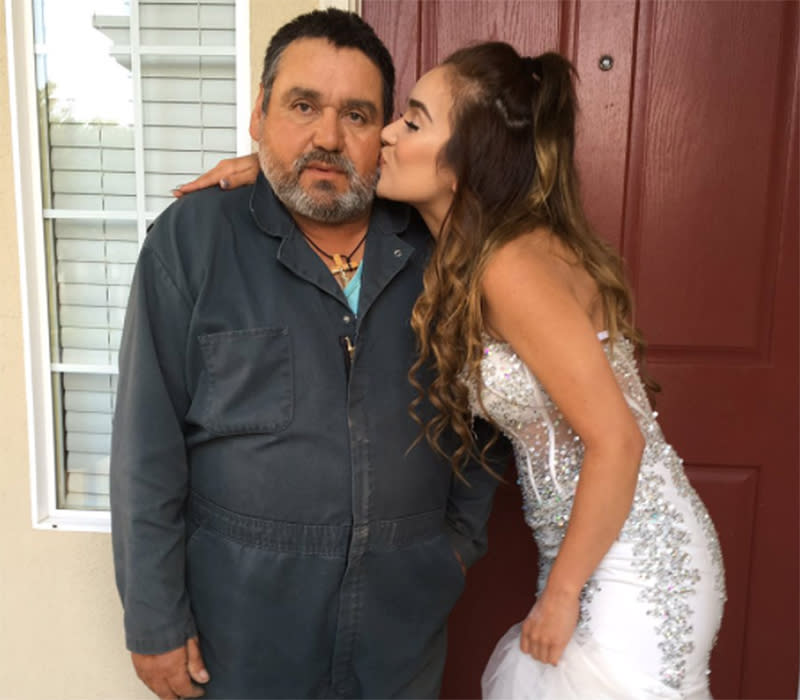 Lourdes Medrano dressed up for prom a second time, so her father could take pictures with her after missing the big event because of work. 