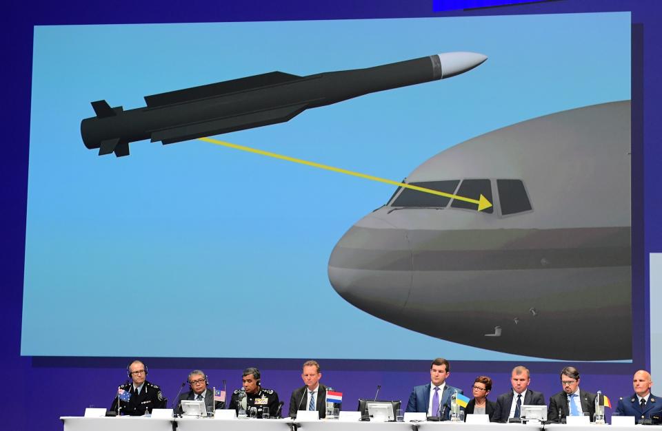 TOPSHOT - Members of a joint investigation team present the preliminary results of the criminal investigation into the downing of Malaysia Airlines flight MH17, in Nieuwegein, on September 28, 2016.   Last year a separate inquiry led by the Dutch Safety Board (OVV) found the Boeing 777 was hit by a BUK missile fired from an area most likely in rebel-held eastern Ukraine, where pro-Russian separatists have been battling Ukrainian forces since early 2014. / AFP PHOTO / EMMANUEL DUNAND        (Photo credit should read EMMANUEL DUNAND/AFP/Getty Images)