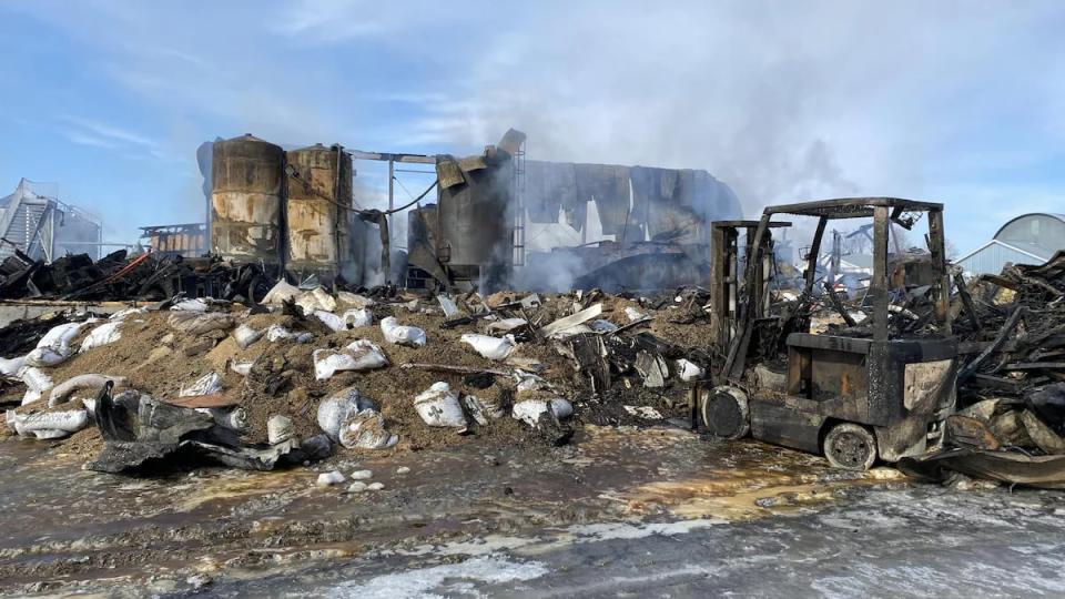It took firefighters around 10 hours to put out the flames, which lingered until 3 a.m. on Saturday.   (Philippe L’Heureux/Radio-Canada - image credit)