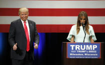 <p>Trump reacts to the words of his wife Melania as she addresses the crowd at a rally at the Milwaukee Theatre, April 4, 2016, in Milwaukee.<i> (Photo: Charles Rex Arbogast/AP)</i> </p>