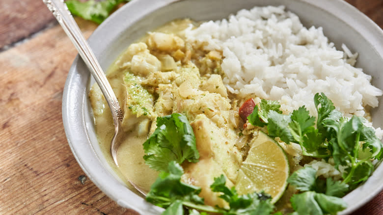 fish curry with rice in bowl
