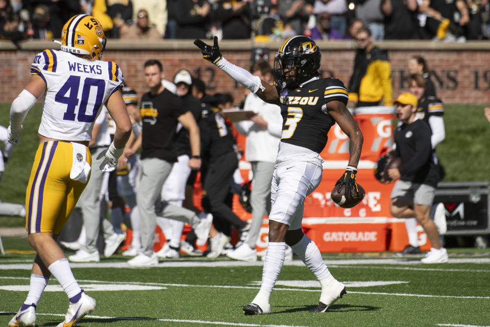 FILE - Missouri wide receiver Luther Burden III, right, celebrates a first down during the first quarter of an NCAA college football game Saturday, Oct. 7, 2023, in Columbia, Mo. Burden III has been selected to The Associated Press midseason All-America team, Wednesday, Oct. 18, 2023.(AP Photo/L.G. Patterson, File)