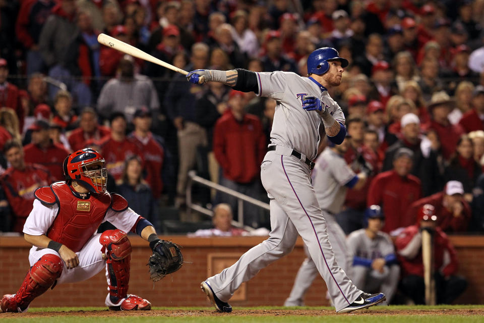 ST LOUIS, MO - OCTOBER 27:  Josh Hamilton #32 of the Texas Rangers hits a two-run home run in the 10th inning during Game Six of the MLB World Series against the St. Louis Cardinals at Busch Stadium on October 27, 2011 in St Louis, Missouri.  (Photo by Jamie Squire/Getty Images)