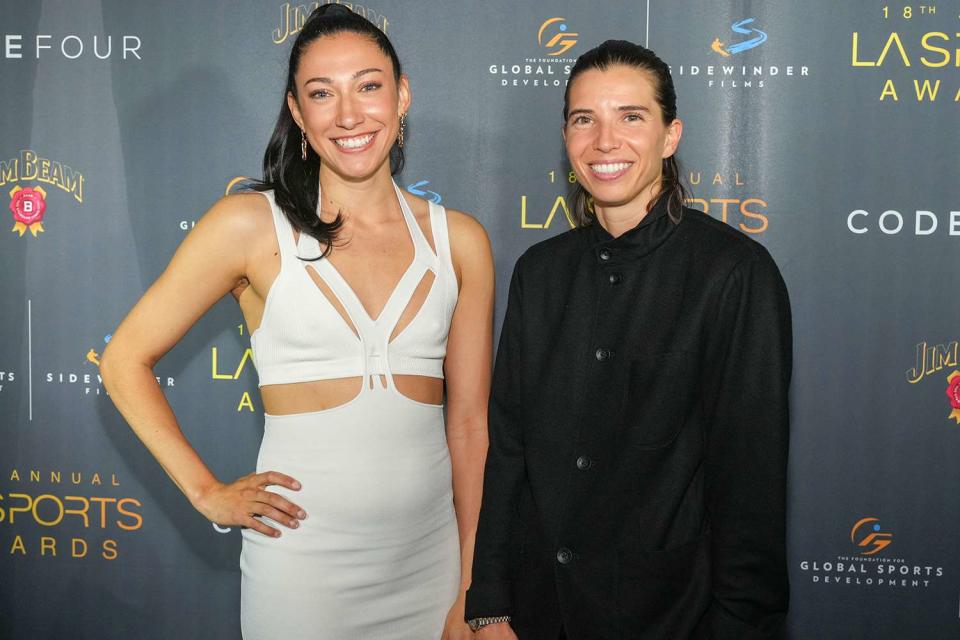 <p>John Wolfsohn/Getty Images</p> Christen Press and Tobin Heath