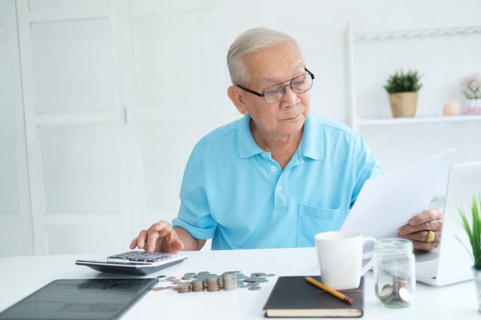 A person reviewing financial documents.