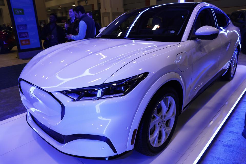 A Ford Mustang Mach-E all-electric SUV is on display during a preview at the Washington, D.C. Auto Show at Walter E. Washington Convention Center on January 19, 2023 in Washington, DC.