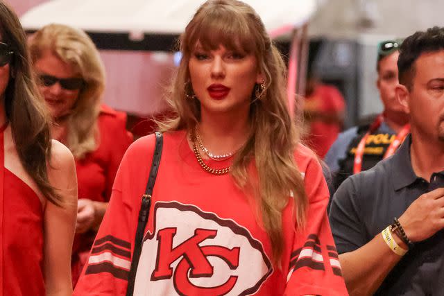 <p>Scott Winters/Icon Sportswire via Getty</p> Taylor Swift arrives at the stadium before an NFL game between the Cincinnati Bengals and Kansas City Chiefs on September 15, 2024 at GEHA Field at Arrowhead Stadium