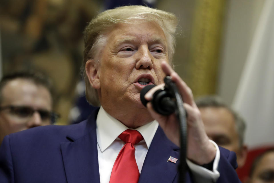 President Donald Trump speaks before signing a trade agreement with Japan in the Roosevelt Room of the White House on Monday. (Photo: Evan Vucci/AP)  