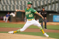 Oakland Athletics starting pitcher Chris Bassitt (40) delivers against the Texas Rangers during the first inning of a baseball game, Friday, Aug. 6, 2021, in Oakland, Calif. (AP Photo/D. Ross Cameron)