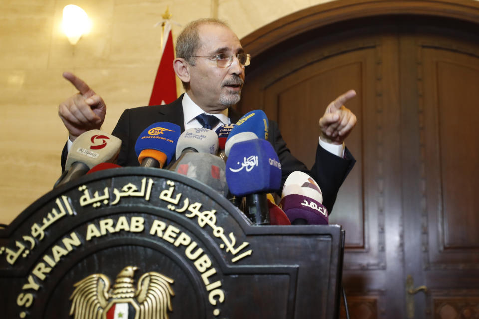 Jordan Foreign Minister Ayman Safadi speaks during a press conference with his Syrian counterpart Faisal Mekdad, after their meeting in Damascus, Syria, Monday, July 3, 2023. Jordan's top diplomat Monday called for international investment into crisis-hit Syria's crippled infrastructure in order to speed up refugee returns. Safadi made these remarks following a visit to Damascus, where he met with Syrian President Bashar Assad and his counterpart Faisal Mekdad. (AP Photo/Omar Sanadiki)