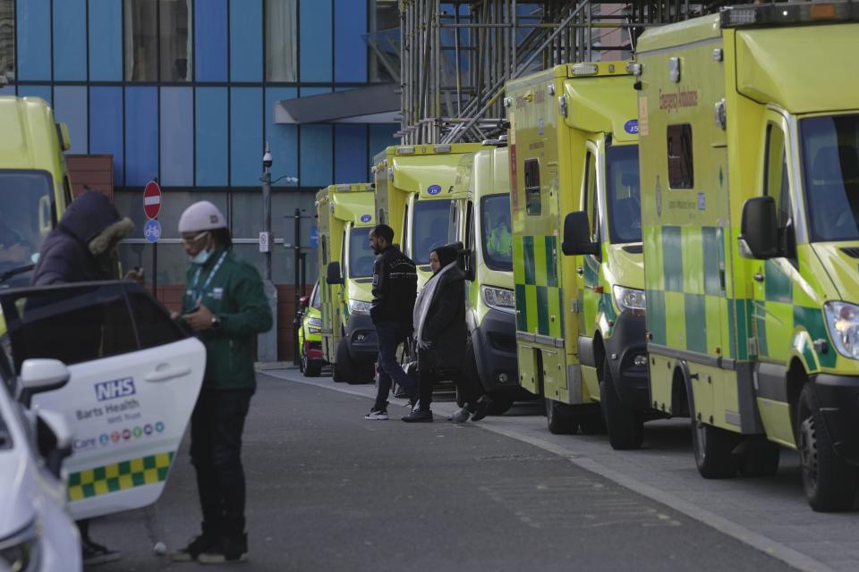 Ambulances park as the workers take part in a strike in London, Wednesday, Jan. 11, 2023. Around 25,000 U.K. ambulance workers went on strike Wednesday, walking out for the second time since December in an ongoing dispute with the government over pay. (AP Photo/Kin Cheung)